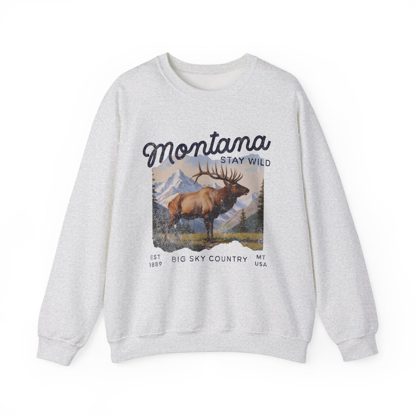 Vintage-style sweatshirt featuring a Montana elk graphic with mountain scenery and “Stay Wild” and “Big Sky Country” text.