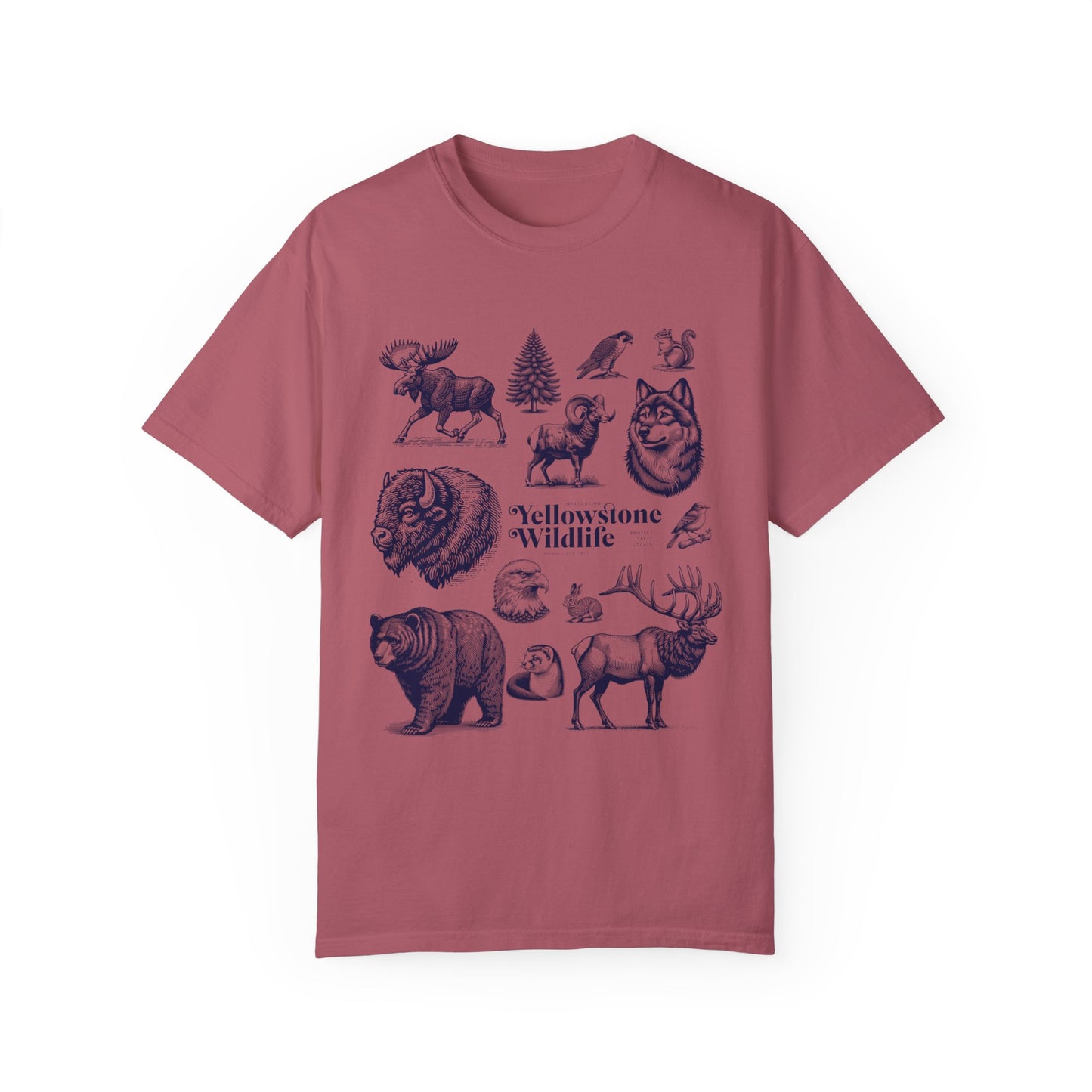 A soft garment-dyed t-shirt featuring vintage illustrations of Yellowstone wildlife including a bear, elk, wolf, and eagle.