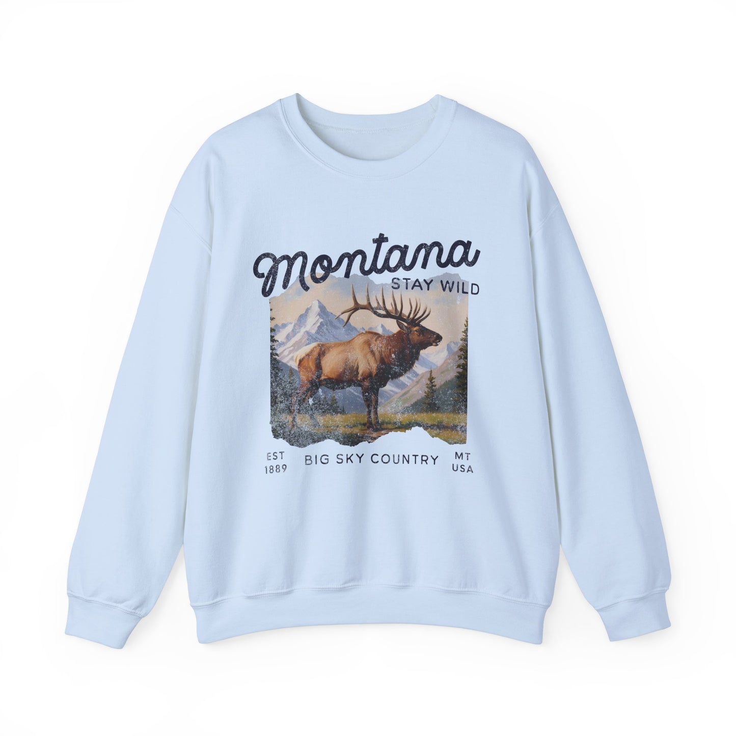 Vintage-style sweatshirt featuring a Montana elk graphic with mountain scenery and “Stay Wild” and “Big Sky Country” text.
