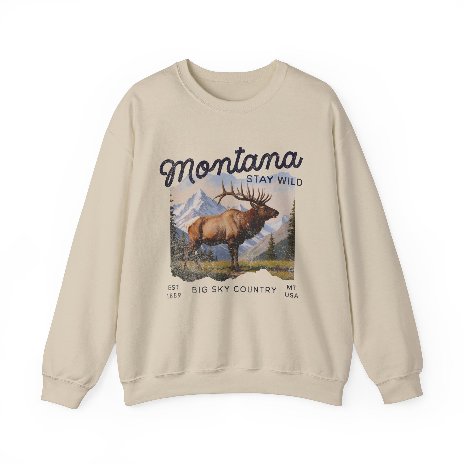Vintage-style sweatshirt featuring a Montana elk graphic with mountain scenery and “Stay Wild” and “Big Sky Country” text.