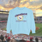 Baby Blue Comfort Colors Crewneck Sweatshirt with a retro vintage inspired baseball character mascot. The text reads Cleveland Total Solar Eclipse CLE baseball April 2024