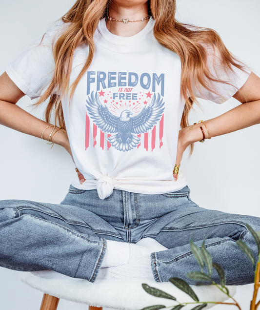 Comfort Colors Tshirt featuring a Patriotic Eagle and text graphic that reads Freedom is not free