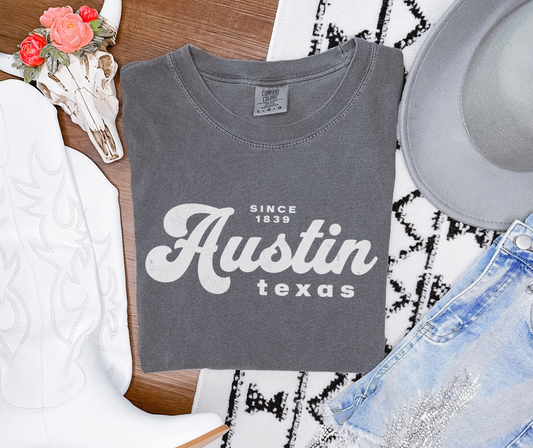 Retro Inspired Text Graphic That reads Austin texas since 1839. Printed on a Comfort colors crewneck Tshirt