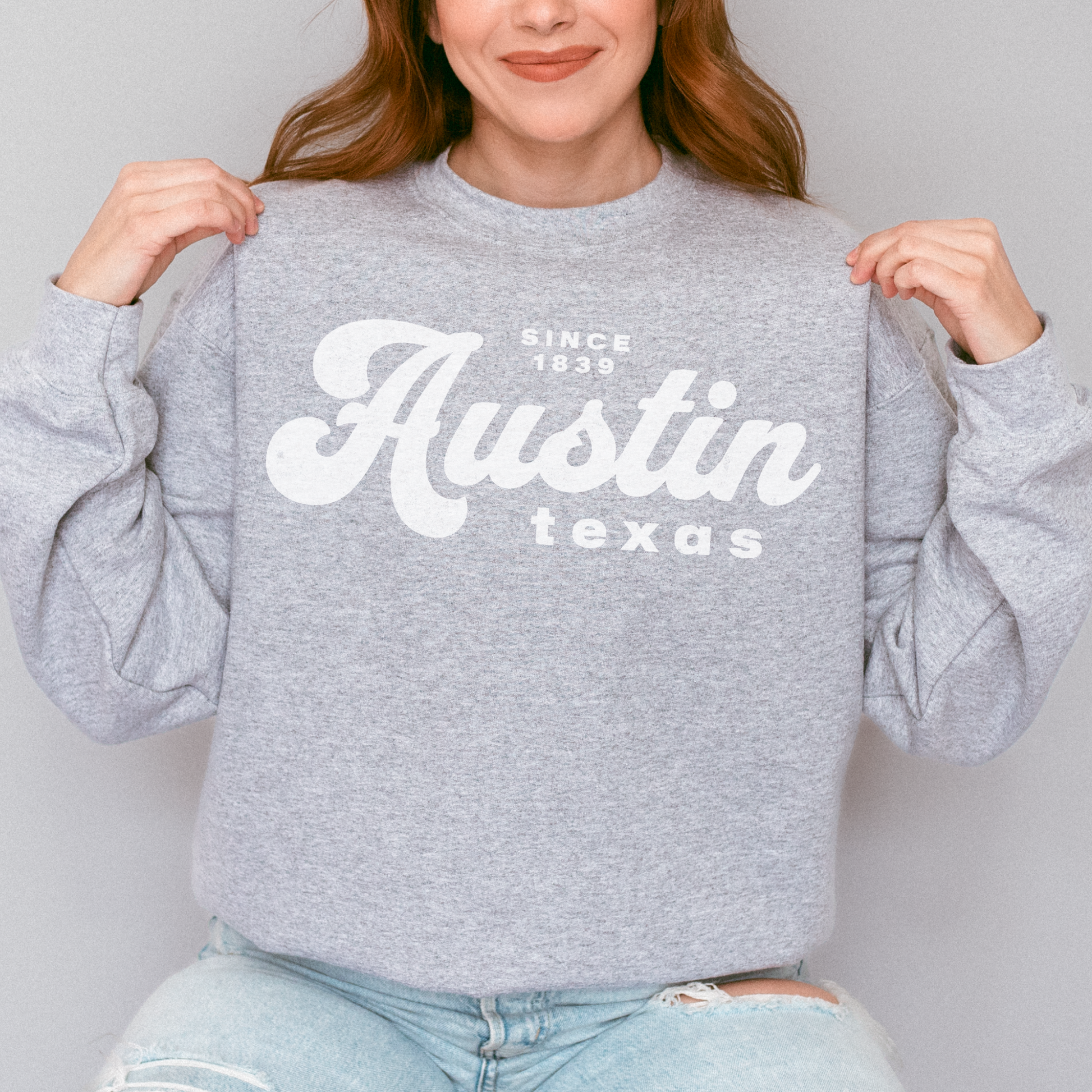 Retro Inspired Text graphic that reads Austin Texas Since 1839 printed on a crewneck sweatshirt