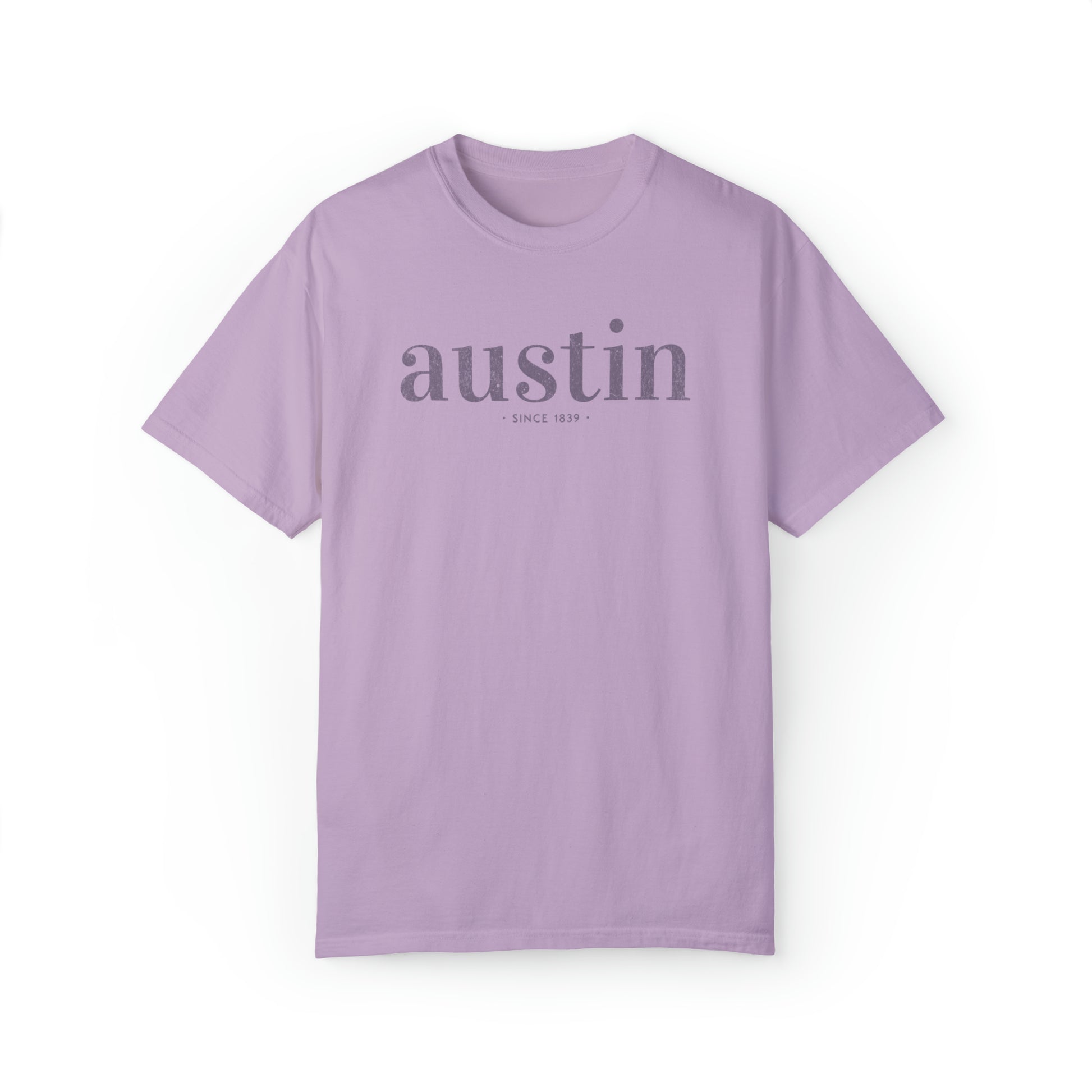 A Comfort Colors TShirt with a simple text graphic that reads austin since 1839 inspired by Austin, Texas