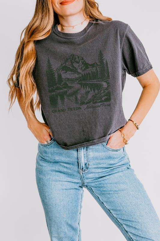Vintage Inspired Mountain landscape graphic on a comfort colors boxy cropped tee that reads Grand Teton National Park
